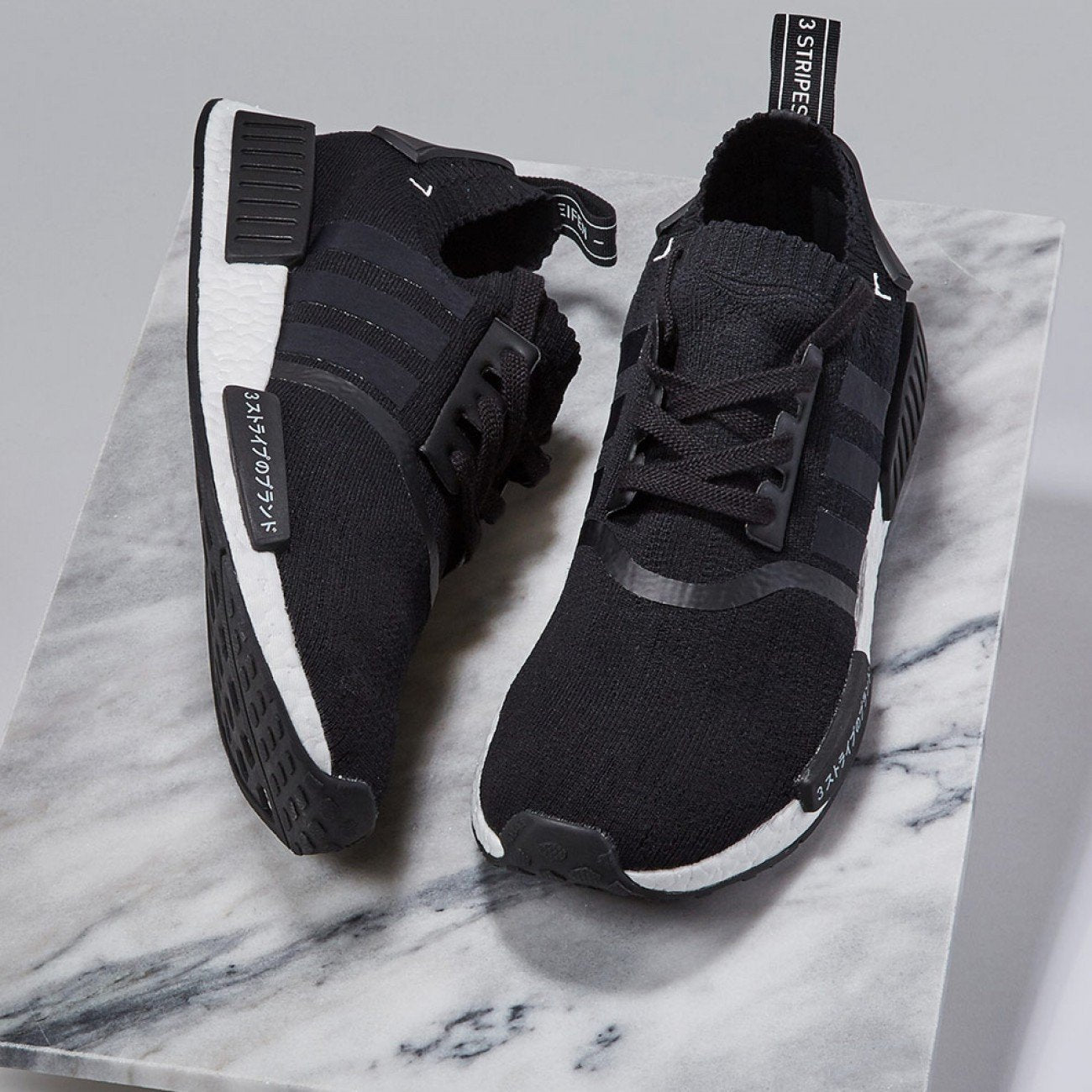 NMD R1 PK Japan Black Boost - DistriSneaks